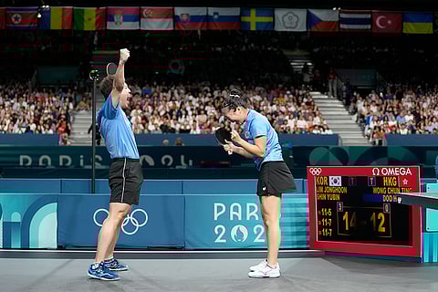 Shin Yubin and Lim Jonghoon celebrate their win